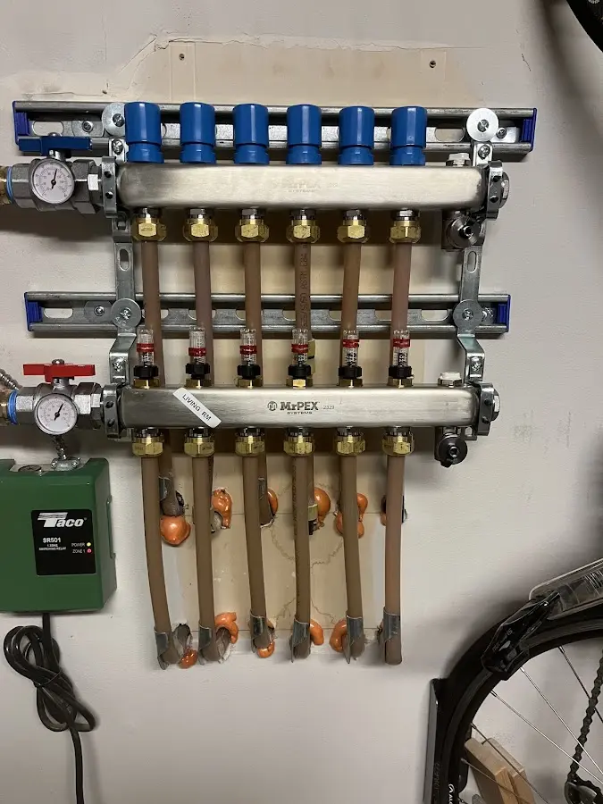 Plumber performing Water Heater Repair at a residential property in Arlington